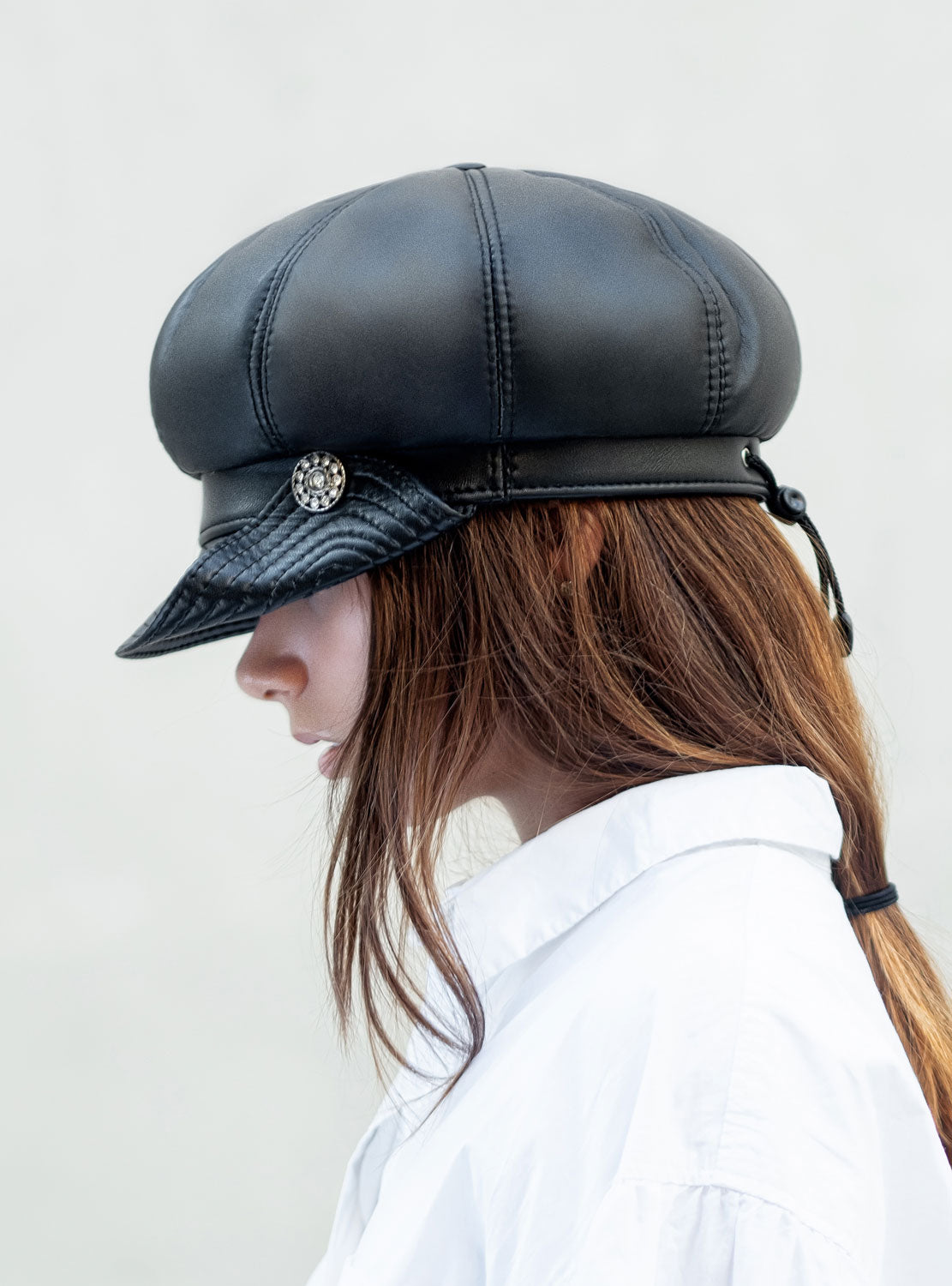 Leather cap with inverted peak